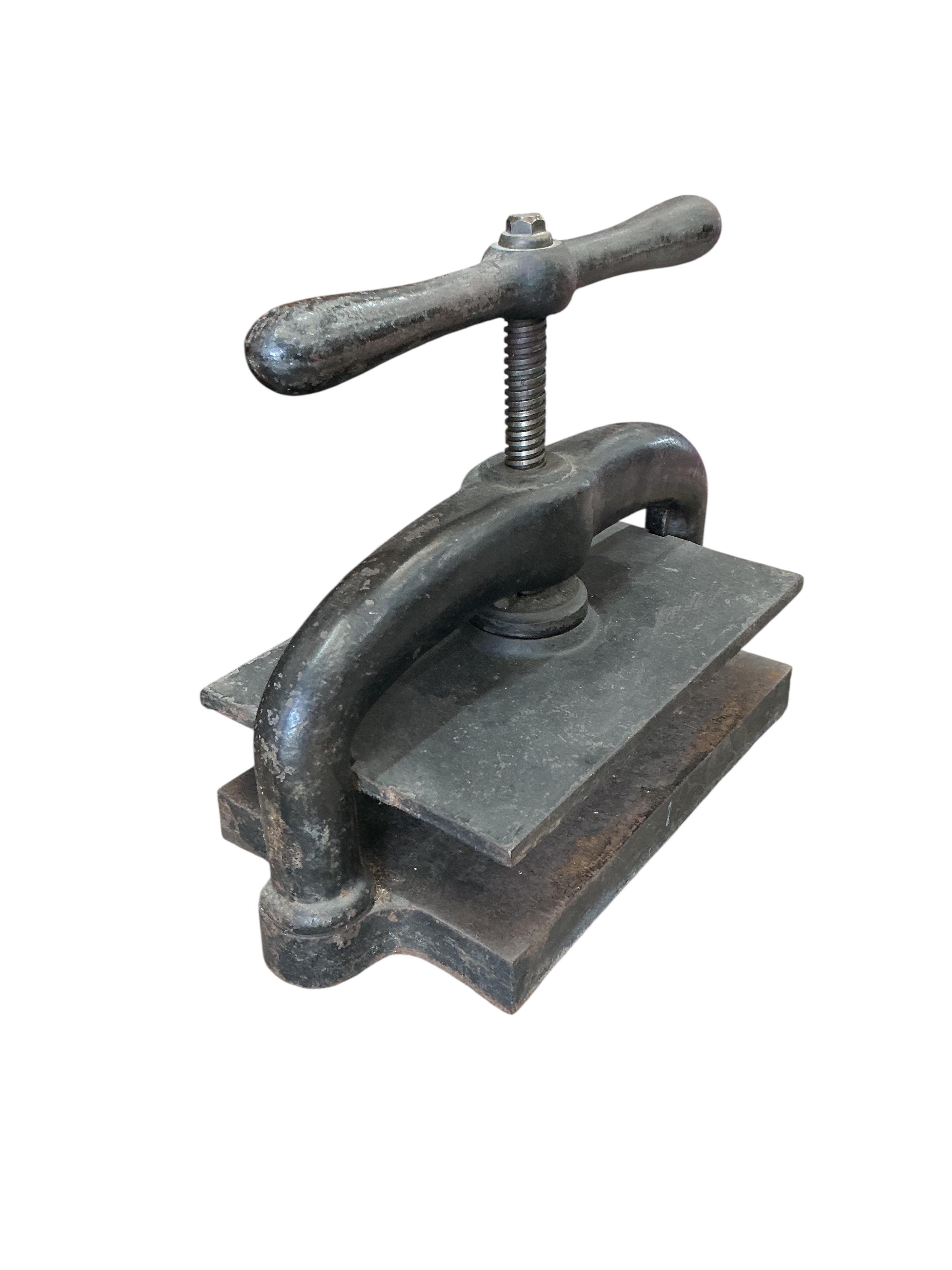 A Victorian cast iron book press, width 48cm, depth 25cm, height 37cm